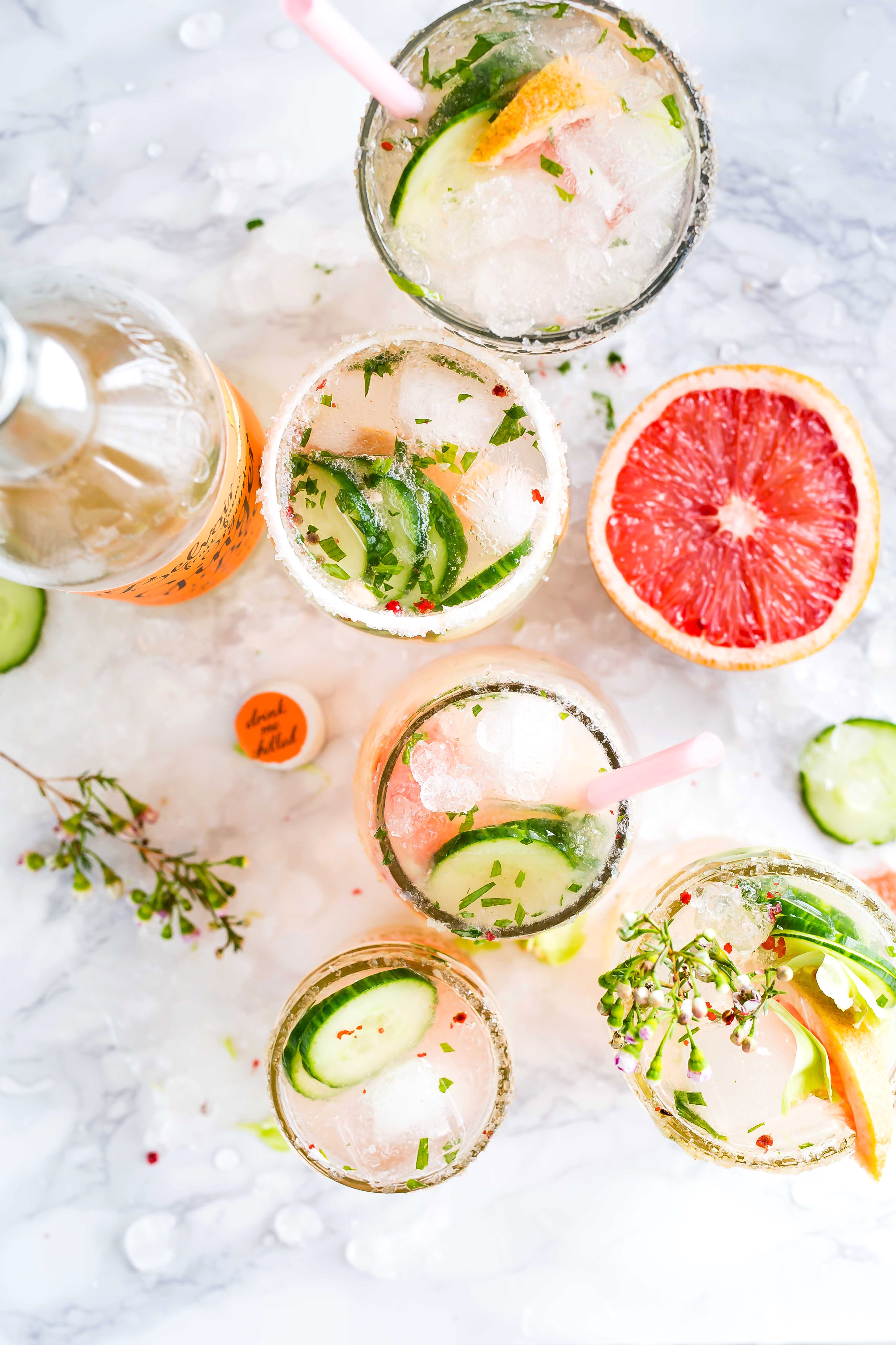 Make your water tasty with cucumber mint and lemon combination. I love to drink water this way. Here is glasses filled with water and ice along with lemon, mint and cucumber.