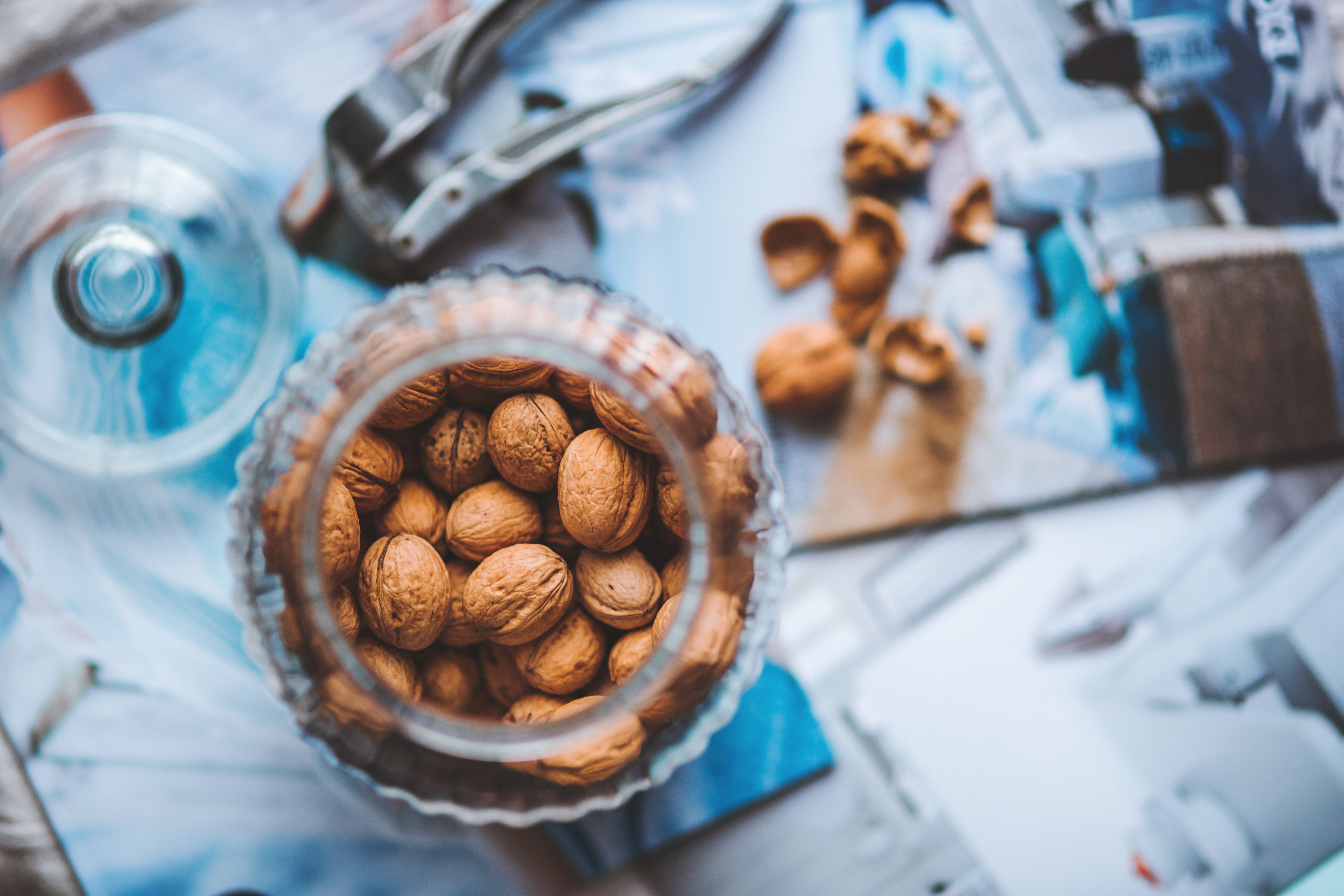 Nuts are also a good food option for healthy breakfast. Here is a jar of walnuts.