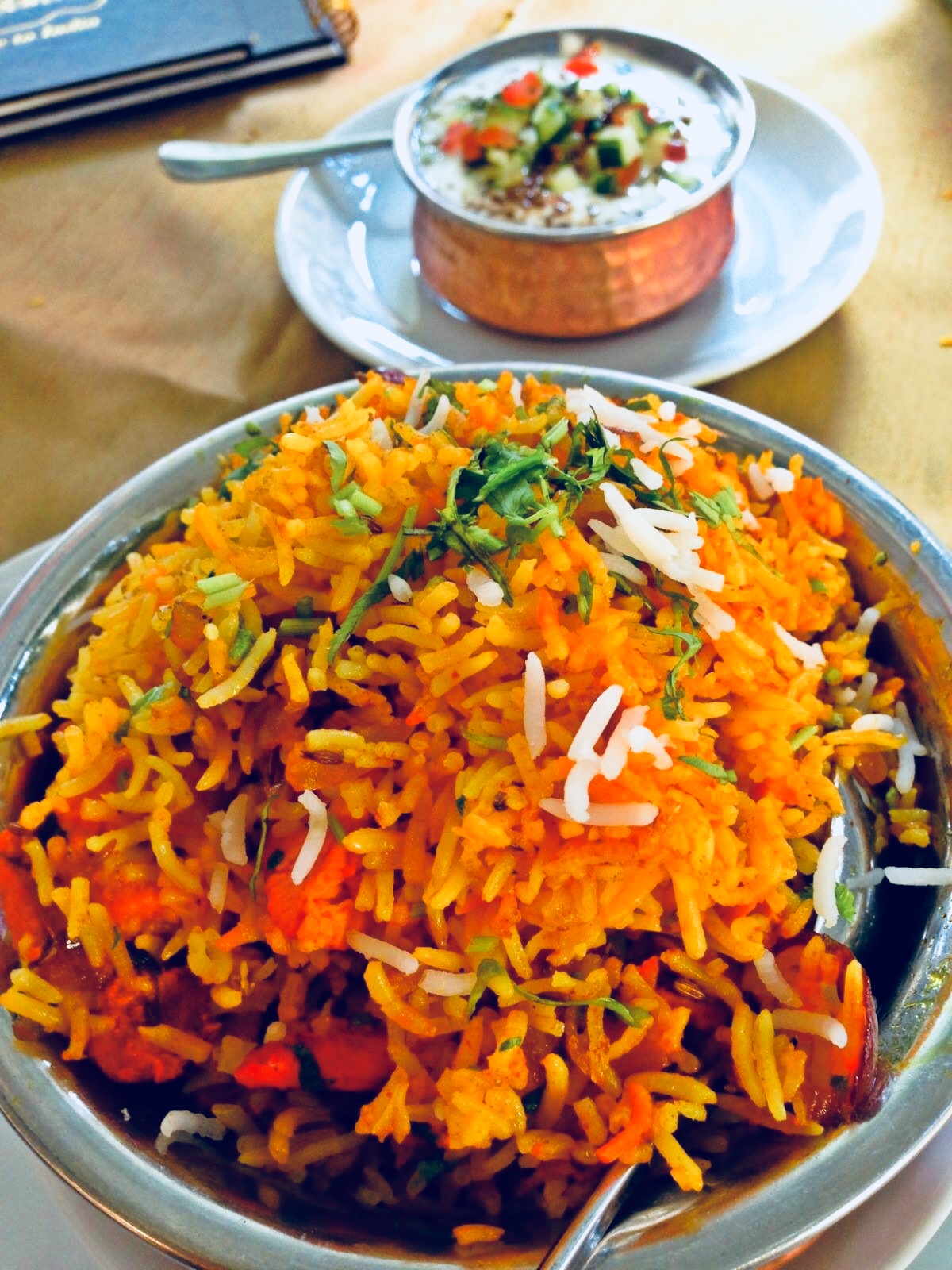 kebabs and curries co is very famous for it's chicken biryani. Here is a bowl of chicken biryani. 